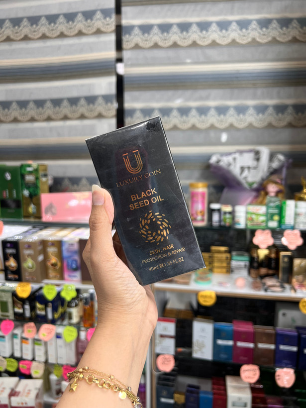 روغن سیاه دانه لاکچری کوین بلک سید اویل